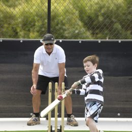child playing cricket at Maitraya homestead, Albany